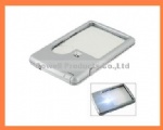 Credit card magnifier with LED light